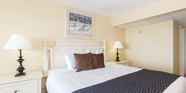 Oceanfront King Efficiency The pet-friendly Oceanfront Efficiency includes one large king bed and one bath in an efficiency styled suite connected to an oceanfront, private balcony. And dine-in for a meal using the fully-equipped kitchen, including an oven, stovetop, microwave, and refrigerator.
