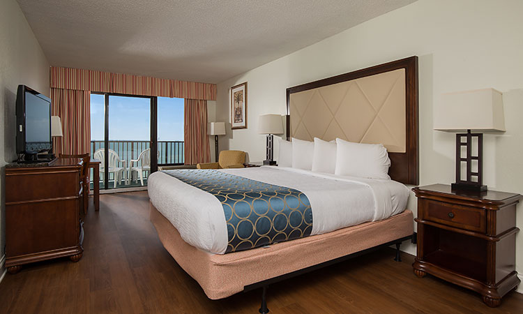 The pet-friendly Oceanfront Efficiency includes one large king bed and one bath in an efficiency styled suite connected to an oceanfront, private balcony. And dine-in for a meal using the fully-equipped kitchen, including an oven, stovetop, microwave, and refrigerator.